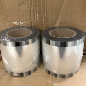 CUỘN MÀNG ÉP NẮP LY NHỰA TRONG